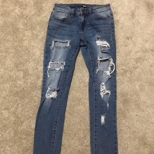 dark wash jeggings ripped jeans